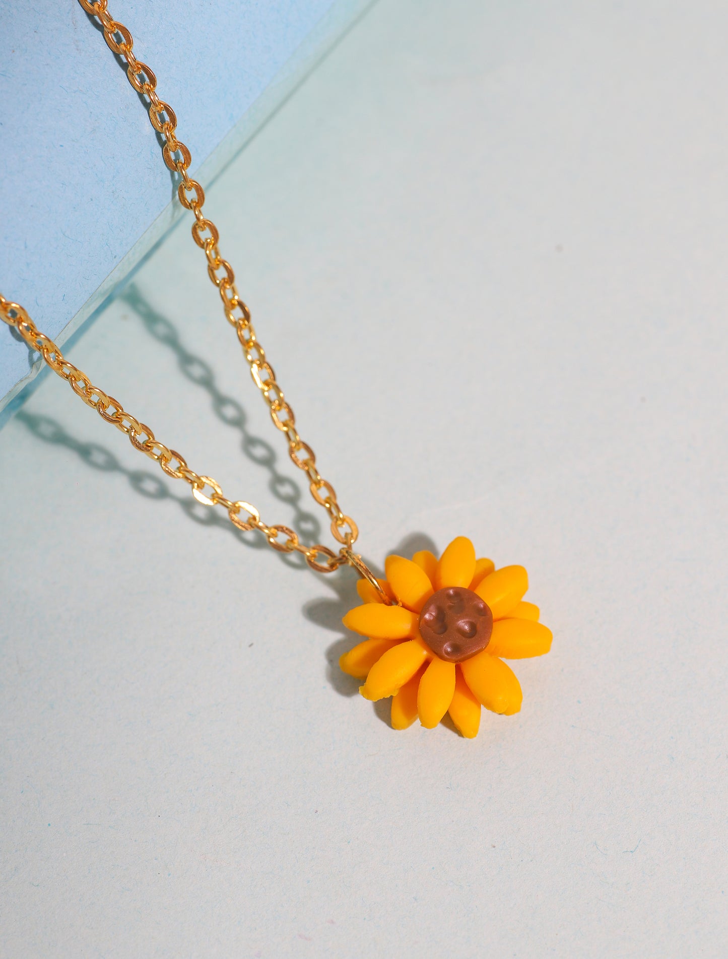 Sunflower pendant with gold chain