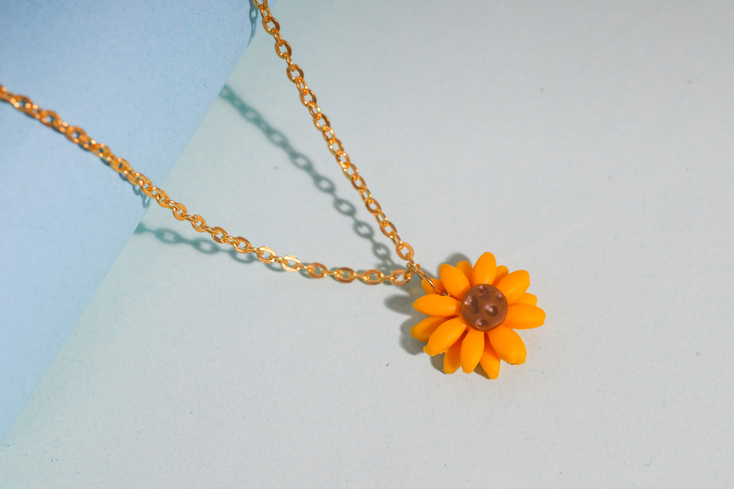 Sunflower pendant with gold chain